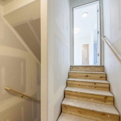Interior of the stairs going down the basement under construction